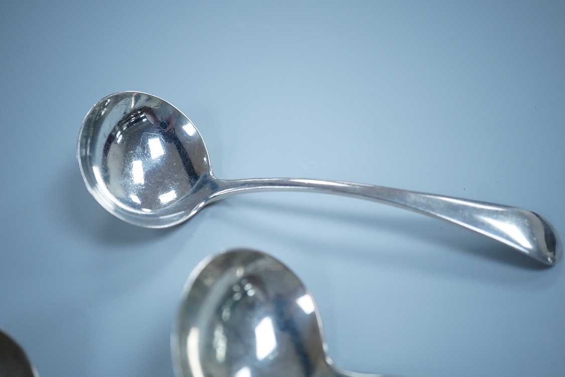A pair of George IV silver King's husk pattern sauce ladles, by William Chawner II, London, 1825/27, 18.2cm, together with a pair of George VI Old English pattern sauce ladles, James Dixon & Sons, Sheffield, 1936, 7.9oz.